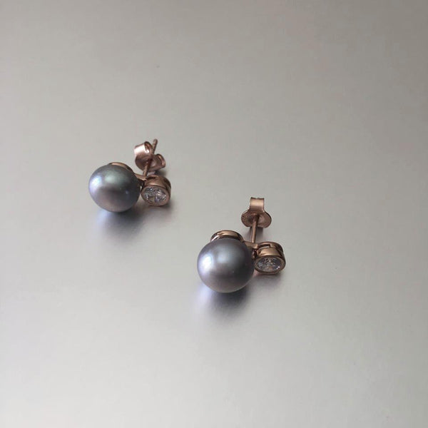 These stunning rose gold studs embedded with grey pearls and cubic zirconia are my ultimate favorite. I can wear them with everything, literally everything.