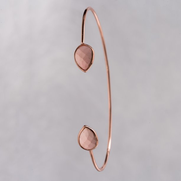 Lightweight, delicate, petite open cuff, enhanced with a gorgeous 3.02 carat of pink opal is mesmerizingly beautiful and eye-catching