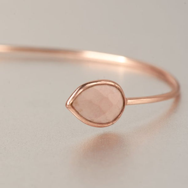 Lightweight, delicate, petite open cuff, enhanced with a gorgeous 3.02 carat of pink opal is mesmerizingly beautiful and eye-catching