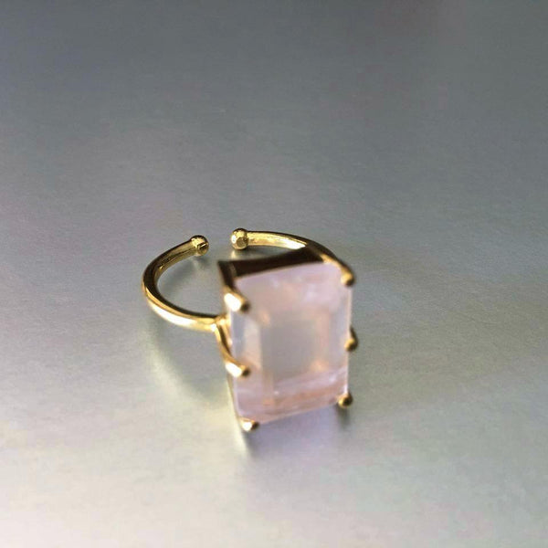 This adorable rose quartz adjustable ring is eye candy, for it is a little fun, a little flirtatious, and mainly a fashionista's desire to own. Rose quartz, with its gentle pink essence, is a stone of the heart, a Crystal of Unconditional Love. It carries a soft feminine energy of compassion and peace, tenderness, nourishment, and comfort. 