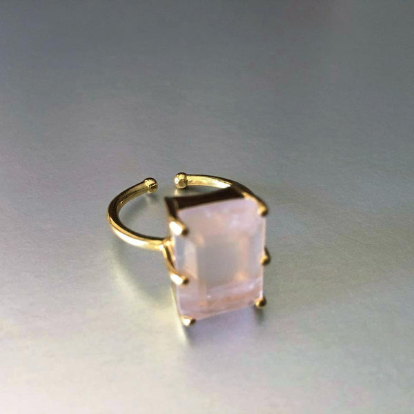 This adorable rose quartz adjustable ring is eye candy, for it is a little fun, a little flirtatious, and mainly a fashionista's desire to own. Rose quartz, with its gentle pink essence, is a stone of the heart, a Crystal of Unconditional Love. It carries a soft feminine energy of compassion and peace, tenderness, nourishment, and comfort.