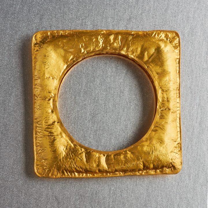 Sterling silver with gold plating. Hand hammered, lightweight bracelet in an unusual design that is perfect for a ramp walk, wear it single or stack them up and flaunt a style of your own