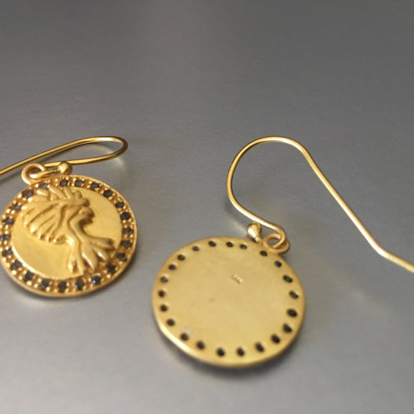 Tree of life earrings may have many connotations, symbolizing a family and connections to ancestors or to have continuity through all generations or simply being a connection to all things. Tiny garnet entails this sterling silver earring, with gold plating, thereby adding a touch of shimmer, finesse, and elegance. The earring does have some weight and feel to it with the gemstones.