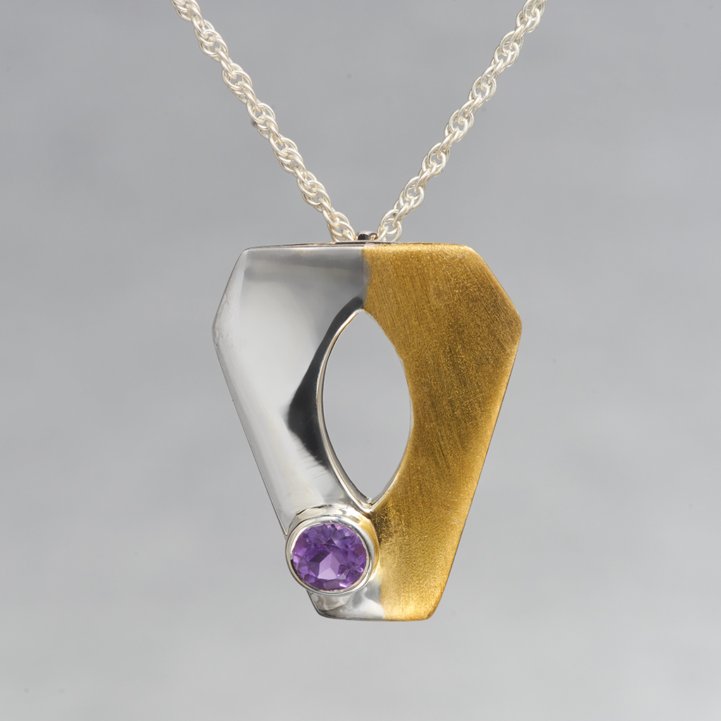 Simplicity at it's best. A lightweight, delicate sterling silver gold plated pendant is applauded for it's fine craftsmanship and elegant appeal. The pendant holds a 4mm round faceted amethyst gemstone.