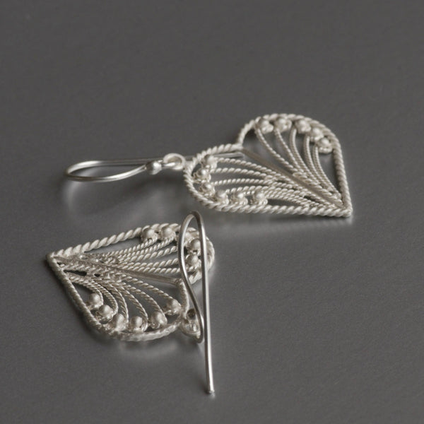 Featherweight, heart-shaped, filigree work, dainty earrings with hand-hammered texture, these cute little delicate yet durable earrings are sure to win your heart and others around you.   Fun and playful, these popular earrings are simple and clean for an effortless style that can go with anything. The most popular pair of earrings sold in 2021 & 2022.