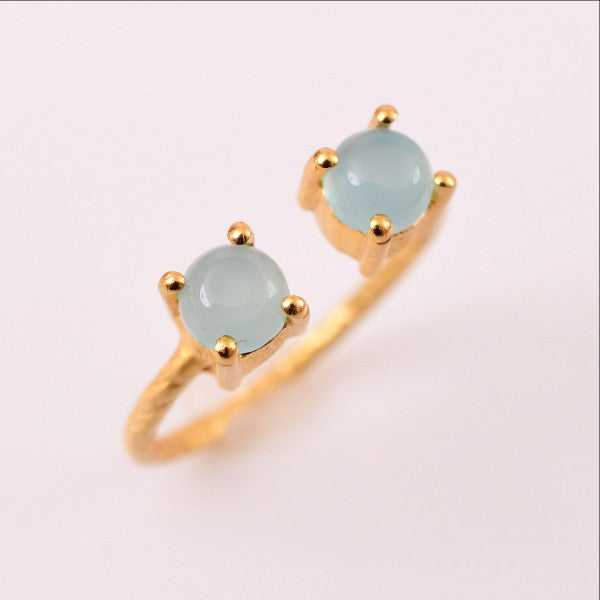 This adjustable, dainty ring with aqua chalcedony gemstones in a hand hammered texture, is simply a pop of fresh colour and style.