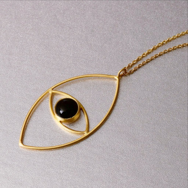 This beautiful luxe boho necklace adorned with black onyx in an inticate design of an 'evil eye' is far from subtle. A must-have layer of the season. Dress down or dress up.
