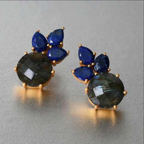 A must -have for the style conscious sophisticate, this stud earrings is luxury jewelry that speaks for itself. Adorned with lapis and labradorite gemstones, this pair of designer earrings is simply exquisite.