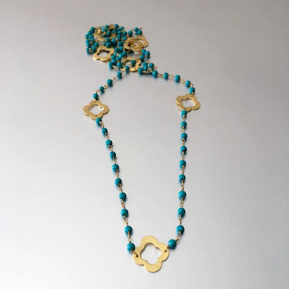 An everyday essential is reimagined with the 'Clover Necklace'. Featuring tiny, lightweight turquoise beads and adorable gold plated clover charms hung graciously all around the necklace. The common saying, "looks can be deceiving" is appropriate to use for this necklace. Lightweight, delicate yet sturdy and durable and surely creating the statement look.