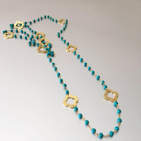 An everyday essential is reimagined with the 'Clover Necklace'. Featuring tiny, lightweight turquoise beads and adorable gold plated clover charms hung graciously all around the necklace. The common saying, "looks can be deceiving" is appropriate to use for this necklace. Lightweight, delicate yet sturdy and durable and surely creating the statement look.