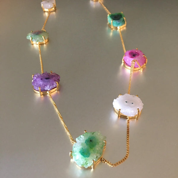 An eye-catching necklace with 8 colored druzy gemstones, that are beautifully showcased on a gold plated chain with extra rings, to make your wear comfortable. 