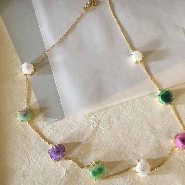 An eye-catching necklace with 8 colored druzy gemstones, that are beautifully showcased on a gold plated chain with extra rings, to make your wear comfortable. 