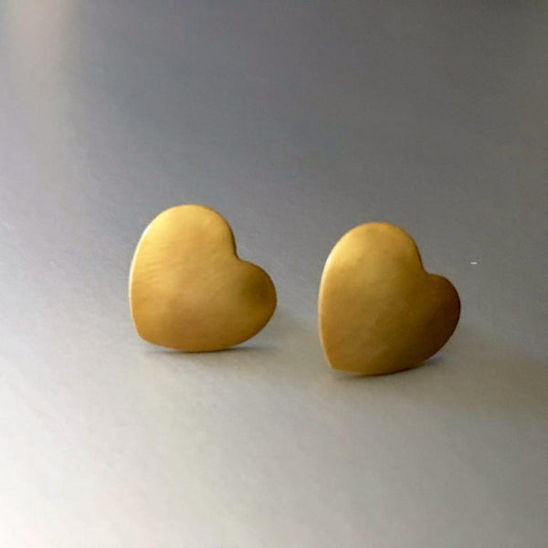 Heart-shaped, gold plated stud earrings with the most simplistic appeal are simply stunning. 