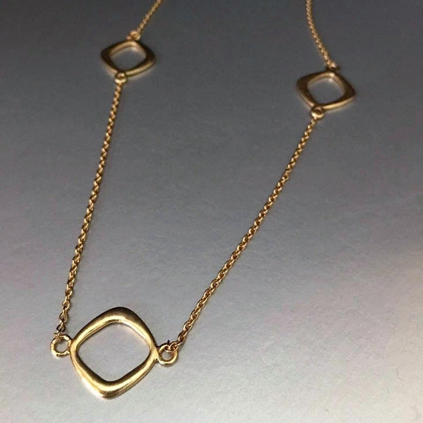 A delicate, no weight, gold plated chain necklace that is versatile and trendy to enhance any attire in your wardrobe. An everyday work jewelry that does the job beautifully: presentable, lightweight and creates quite the cold impression you are looking for.
