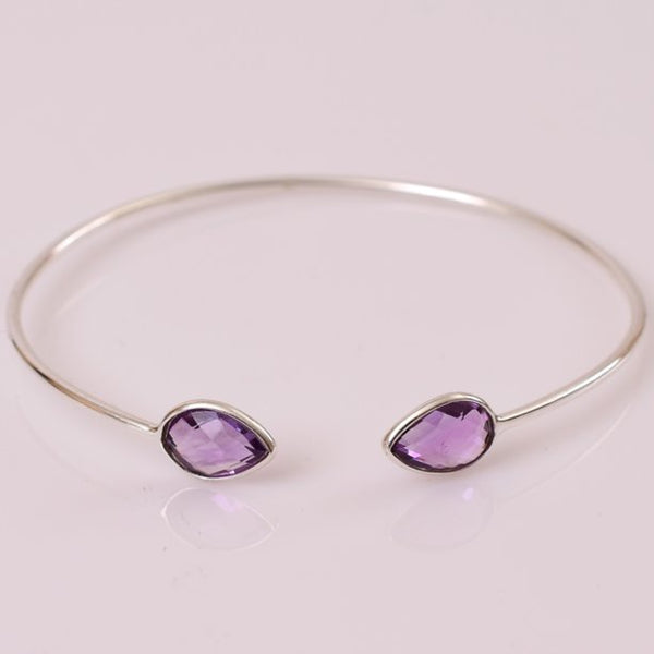 Dainty, lightweight amethsyt sterling silver cuff are simply divine. Amethyst is a meditative and calming stone which works in the emotional, spiritual, and physical planes to provide calm, balance, patience, and peace. 