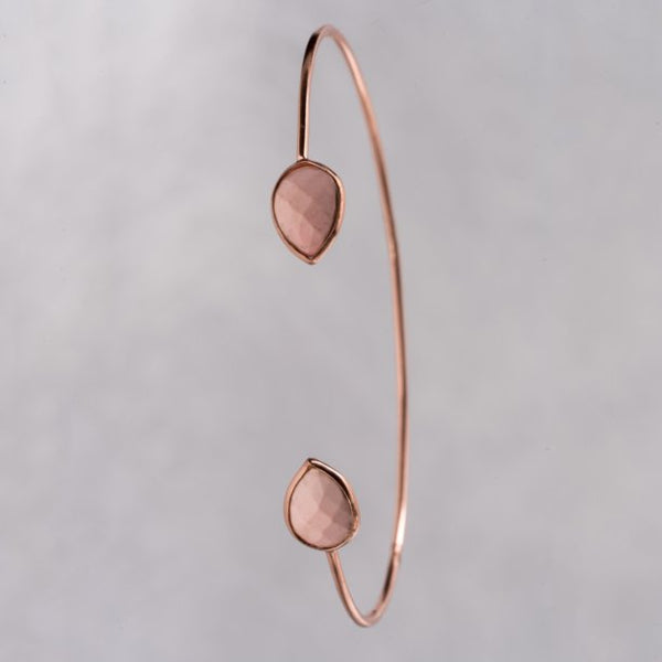 Lightweight, delicate, petite open cuff, enhanced with a gorgeous 3.02 carat of pink opal is mesmerizingly beautiful and eye-catching