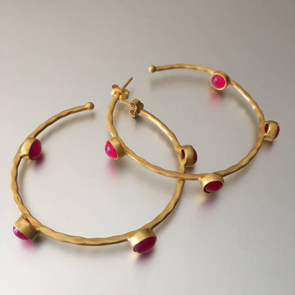 These gold plated, lightweight hoops adorned beautifully with pink chalcedony gemstones are simply too cute. A fashionista's must-have!  A simple pair of earring hoops, that would accentuate any attire. 