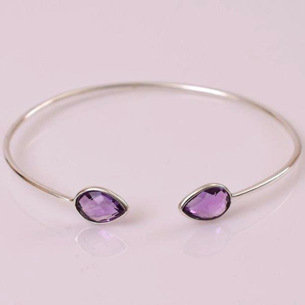 Dainty, lightweight amethsyt sterling silver cuff are simply divine. Amethyst is a meditative and calming stone which works in the emotional, spiritual, and physical planes to provide calm, balance, patience, and peace.