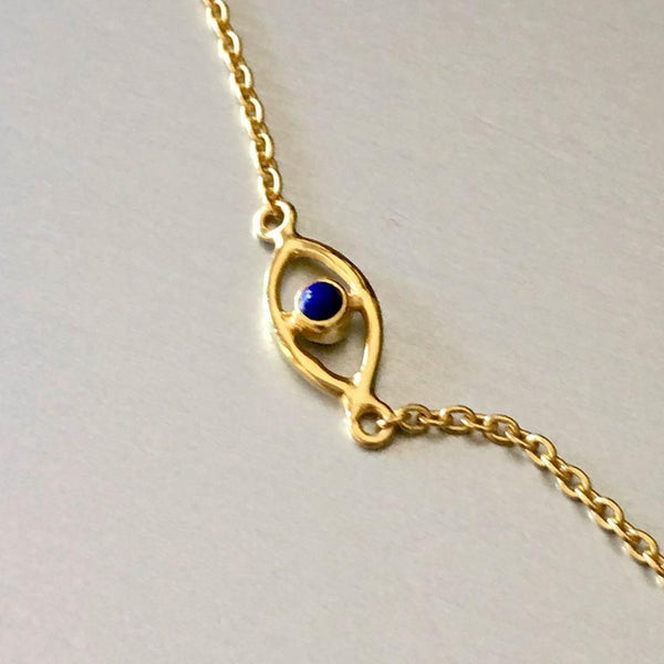 Petite, dainty, gold plated evil eye bracelet with lapis lazuli gemstone is not only adorable but attractive to want to own it and wear it all the time. The adjustable ring makes the wearer comfortable.
