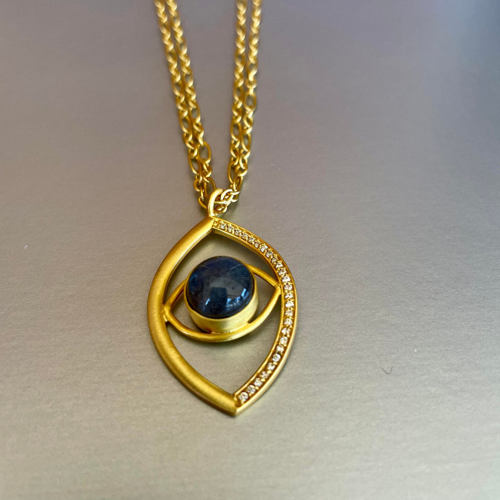 A personal favorite! Yara will be your favorite too, I am very persuasive about it. This 11 1/2 inch long, double-chained necklace holds a 1 1/2 inch sized evil eye pendant so elegantly and freely. Labradorite gemstone is highlighted right in the middle of the pendant and cubic zirconia around one side of the pendant, hence enhancing the overall appeal of this gold-plated necklace. 